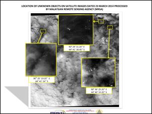 This graphic released by the Malaysian Remote Sensing Agency today shows satellite imagery taken Sunday, with the approximate positions of objects seen floating in the southern Indian Ocean in the search zone for the missing Malaysia Airlines Flight 370. 