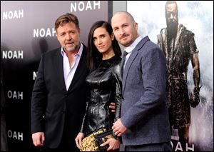 Actors Russell Crowe, left, and Jennifer Connelly pose with director Darren Aronofsky at the premiere of 