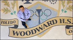 Former Woodward High School principal Emilio Ramirez earned his place in the school’s hall of fame through his leadership when the old building was razed and students and staff moved into the new building a 100 feet away in 2010.