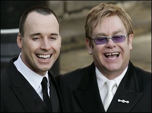 British musician Elton John , right, and his longtime partner David Furnish in 2005.