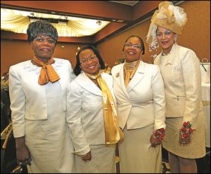Legal honorees at the NANBPWC gala, from left, B. Janelle Butler Phifer, Cynthia Lynne Battles, and Paula Hicks-Hudson, President of Toledo City Council, with chapter president Denise Black-Poon.   