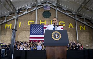 President Barack Obama speaks at the University of Michigan today.