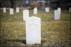 A tombstone for an unknown soldier in the the Confederate cemetery on Johnson Island.