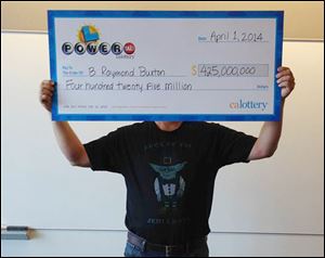 The sole winner of February's $425 million Powerball jackpot came forward to claim his prize Tuesday. B. Raymond Buxton was wearing a shirt that featured a picture of Yoda and read, 