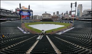 Empty stands are shown at Comerica Park as the baseball game between the Detroit Tigers and Kansas City Royals was postponed due to rain today in Detroit.
