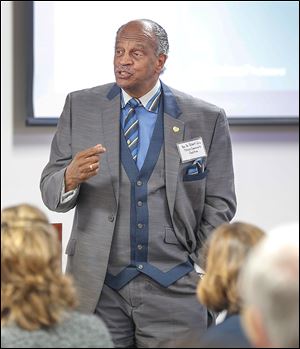 The Rev. Robert Culp, pastor of Toledo’s First Church of God and a co-chairman of the Toledo Community Coalition, was one of 100 people who attended a workshop on poverty earlier on Thursday.