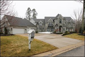 The house at 5 Riverhills Lane in Sylvania Township is listed at $1.035 million. It was built in 2005 and real estate taxes on the property are more than $27,000 per year.