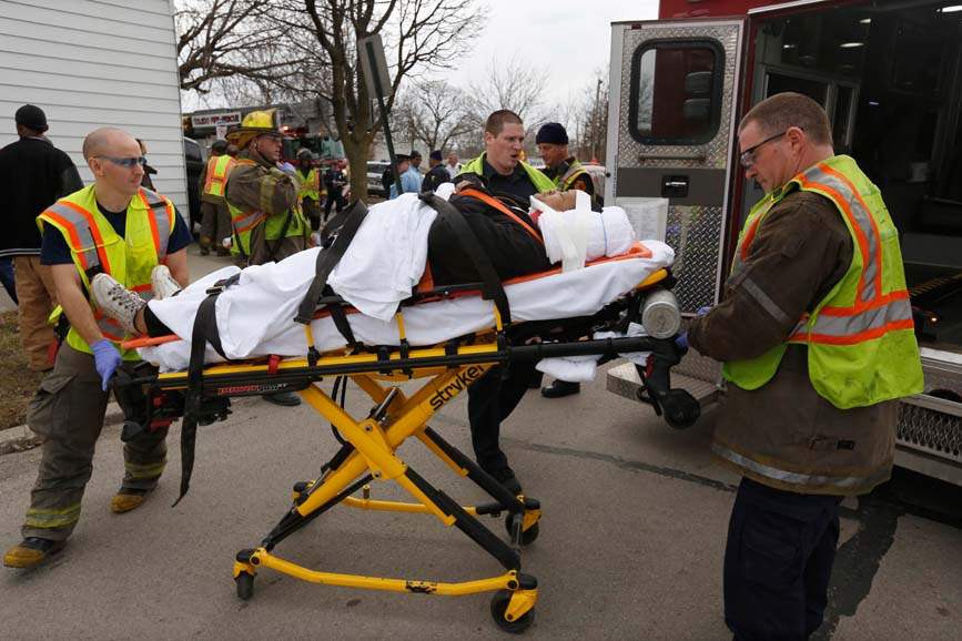 CTY-crash07p-injured-woman-stretcher
