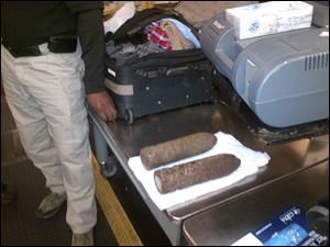 Two World War I artillery shells discovered by baggage screeners in checked luggage that arrived on a flight from London at Chicago's O'Hare International Airport.
