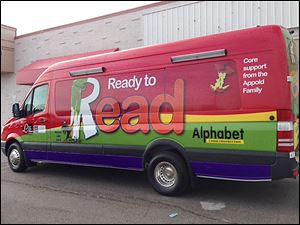 The Toledo-Lucas County Public Library’s Ready to Read van features artwork from the book ‘Alphabet Under Construction.’