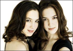 The duo-piano team of Christina and Michelle Naughton, identical twins, will make their debut with the Toledo Symphony in weekend concerts at the Peristyle.