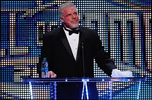 The Ultimate Warrior speaks during the WWE Hall of Fame Induction at the Smoothie King Center in New Orleans on Saturday 