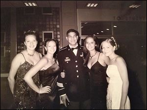 Staff Sgt. Carlos Lazaney-Rodriguez, who had been an Army recruiter at Woodward High, attended the school’s prom  in 2003.