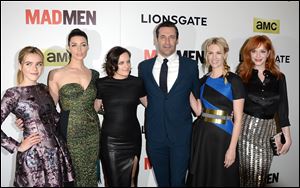 Kiernan Shipka, Jessica Pare, Elisabeth Moss, Jon Hamm, January Jones, and Christina Hendricks attend the AMC celebration of the ‘Mad Men’ Season 7 premiere April 2 in Hollywood, Calif.
