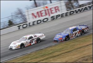 Brian Campbell leads Ross Kenseth during the 7-Up 150 at Toledo Speedway. The race featured drivers from ARCA’s CRA Su­per Ser­ies and the ARCA Mid­west tour.