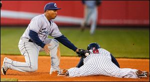 Toledo Mud Hens right fielder Ezequiel Carrera steals second base  Wednesday during the fifth inning of a baseball game at Fifth Third Field in Toledo. Carrera had 1 hit in 4 at bats.