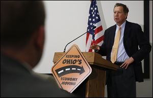 Ohio Gov. John R. Kasich speaks during a recent news conference at the Modern Builders Supply, Inc. in Toledo. A “yes” vote on May 6 for the renewal and expansion of the State Capital Improvements Program would authorize the state to borrow an additional $1.875 billion in general obligation bonds over 10 years for water, sewer, road, bridge, solid-waste, and other local public-works projects. That’s up from $1.35 billion under the current program.