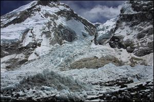 A view of the Kumbhu icefall in 2003, the first hurdle in the ascent to Everest from base camp, is seen from Everest Base camp, where 12 Nepalese guides were killed, Nepal. 