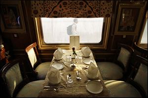 A table is set for passengers inside one of the luxurious cabins of India’s Palace on Wheels.