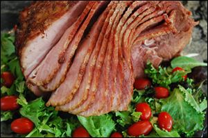Make a simple glaze for your smoked, spiral-sliced ham to bake at home.