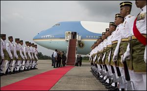 President Barack Obama arrives on Air Force One at the Royal Malaysian Air Force Airbase in Subang, outside of Kuala Lumpur.