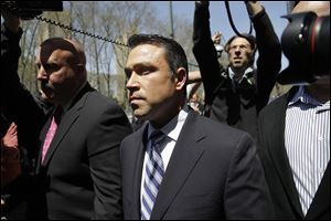 U.S. Rep. Michael Grimm leaves federal court in New York, today.