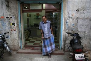 India's Ramesh Agrawal walks outside his shop during an interview in Raigarh in Chhattisgarh state, India. Six environmental advocates from India, Peru, Russia and three other nations have won this year's Goldman Prize, which is awarded annually for grass-roots activism. Agrawal received the prize for helping villagers fight a large coal mine in Chhattisgarh state, the San Francisco-based Goldman Environmental Foundation said today.