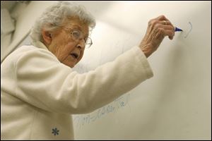 Louisa Strock, 89, teaches her Comp II class at Northwest State Community College on February 1, 2006. 