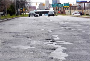 Southbound Anthony Wayne Trail near City Park Avenue is one part of the roadway in need of repair.