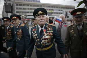 World War II veterans take part in the May Day march in Simferopol, Crimean capital.
