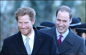 Prince Harry, left, and Prince William, Duke of Cambridge, pictured in this photo from Dec. 25, 2013, were spotted at a Memphis BBQ restaurant on Thursday.