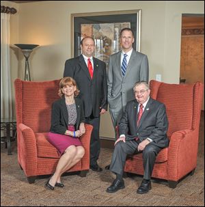 2014 Inductees into the Ac­a­demic Ex­cel­lence Foun­da­tion’s Dis­tin­guished Hall of Fame are seated. Linda Horist and  John MacDonald and standing from left, Mark Greenblatt and Dave Walker. The ceremonies were held at the Sylvania Country Club.