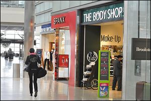 New shops open up along the first floor of Concourse A in McNamara Terminal at the Wayne County-Detroit Metropolitan Airport in Romulus, Mich. Detroit Metro has finished its upgrade of retail shops and hopes the new food and beverage offerings will boost revenue from nonairline sources.