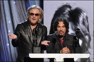 Hall of Fame Inductees, Hall and Oates, Daryl Hall and John Oates speak at the 2014 Rock and Roll Hall of Fame Induction Ceremony on Thursday, April, 10.