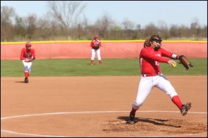 Eastwood's Samantha Shirling winds up to deliver a pitch in the first inning on Tuesday. The Eagles defense turned two double plays against the Wildcats.