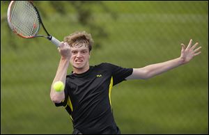 Perrysburg senior Troy Weider returns a shot against Southview’s Cody Wurzelbacher while winning the NLL’s No. 1 singles final.