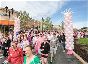Thousands of people walked Saturday to raise funding for breast cancer research and services during the American Cancer Society’s eighth annual Making Strides Against Breast Cancer in Perrysburg.