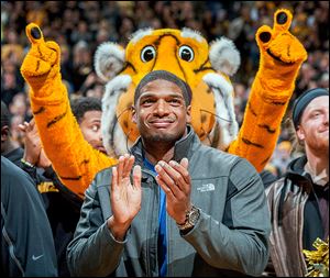 Michael Sam, appearing at a Missouri basketball game in February, was the SEC’s defensive player of the year. His team kept secret that he was gay, something that he disclosed earlier this year.