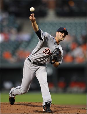 Detroit Tigers starting pitcher Rick Porcello delivers a pitch against the Baltimore Orioles during the first inning.
