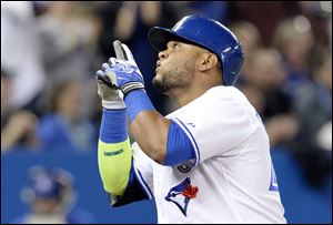 Toronto Blue Jays' Juan Francisco celebrates his home run as he crosses the plate against the Cleveland Indians during the fifth inning.
