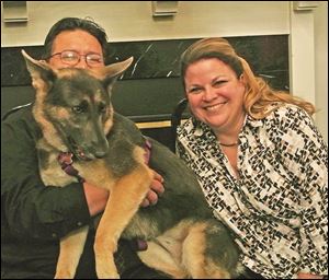 Special guest Dakota and her adoptive parents Dave and Meg Avalos during the Paw Hoorah! fund-raiser.