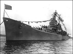 The first USS Toledo, moored in Japan in 1950, was a heavy cruiser. Its construction began in 1943 and finished in 1946. It was one of the first U.S. warships deployed to Korea after the 1950 invasion by the North.