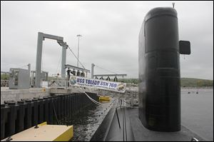 The USS Toledo was just days away from its Groton, Conn., homeport before receiving orders to respond to an emerging world crisis. The submarines are spies of the deep. They battle other subs and fire at land targets.