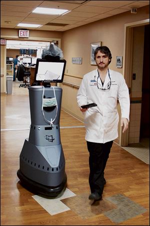 Dr, John Whapham is Director of the Mercy Neurointerventional and Stroke Program. Telemedicine is the use of an autonomous, drivable robot that allows a decrease in response time to assessment and thereby acute treatment.