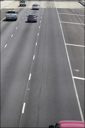 The Ohio Department of Transportation is blaming frost heaves for cracks and uneven surface conditions on freshly rebuilt I-475 in West Toledo. That reconstruction project cost $64 million.