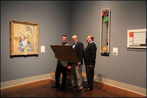 From left, John Duvall, Paul Causman, and Bill Quinlan rehearse at the Toledo Museum of Art for a staged reading of the award-winning drama ‘Art’ at 7 p.m. May 29 in the museum's Little Theater. Admission is free.