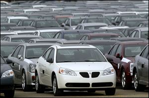 The Pontiac G6  is among the added vehicles GM has recalled. 