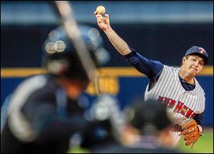 Mud Hens relief pitcher Corey Knebel throws against Syracuse  during at Fifth Third Field. In two appearances, Knebel has surrendered zero runs and struck out four batters in three innings.