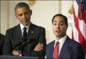 President Barack Obama listens to San Antonio Mayor Julian Castro after announcing the nomination of Castro to lead the Department of Housing and Urban Development today in the State Dinning Room of the White House in Washington.