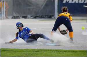 Springfield's Kiley Aller steals second as Notre Dame's Amanda Del Monte waits for the throw.